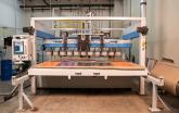 Shuttle Allows Waterjet Operators to Keep Cutting While Unloading Parts